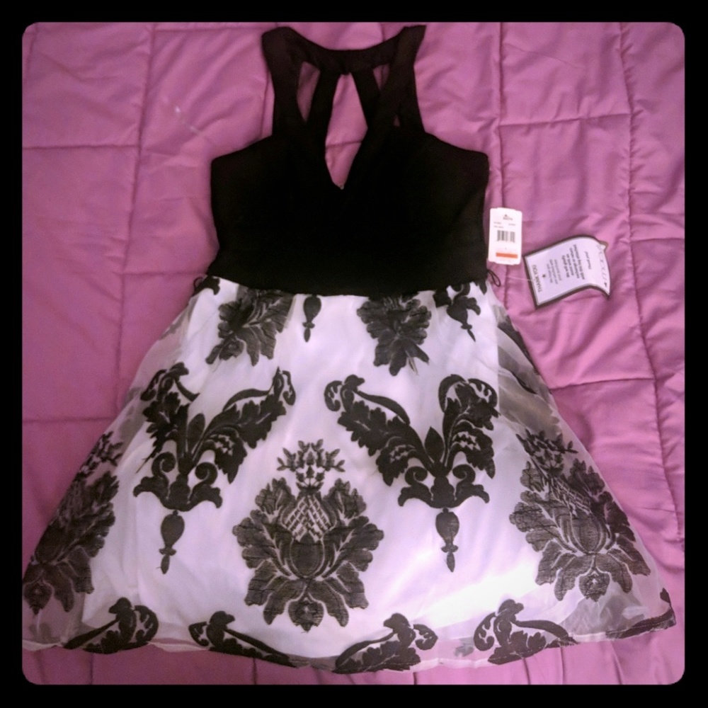 Formal black and white mini dress